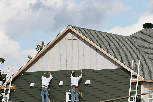 Professional Storm Damage Siding Repair technician working in Hampton, VA